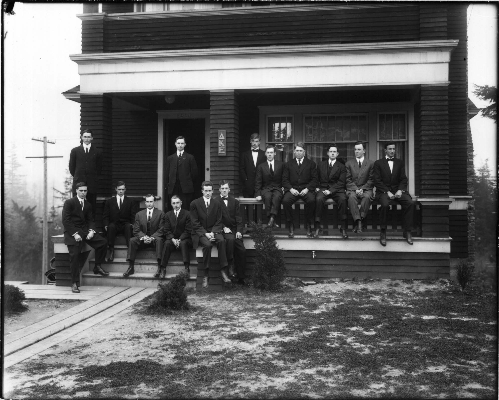 Image of Delta Kappa Epsilon fraternity members outside their house, University of Washington, Seattle, 1915