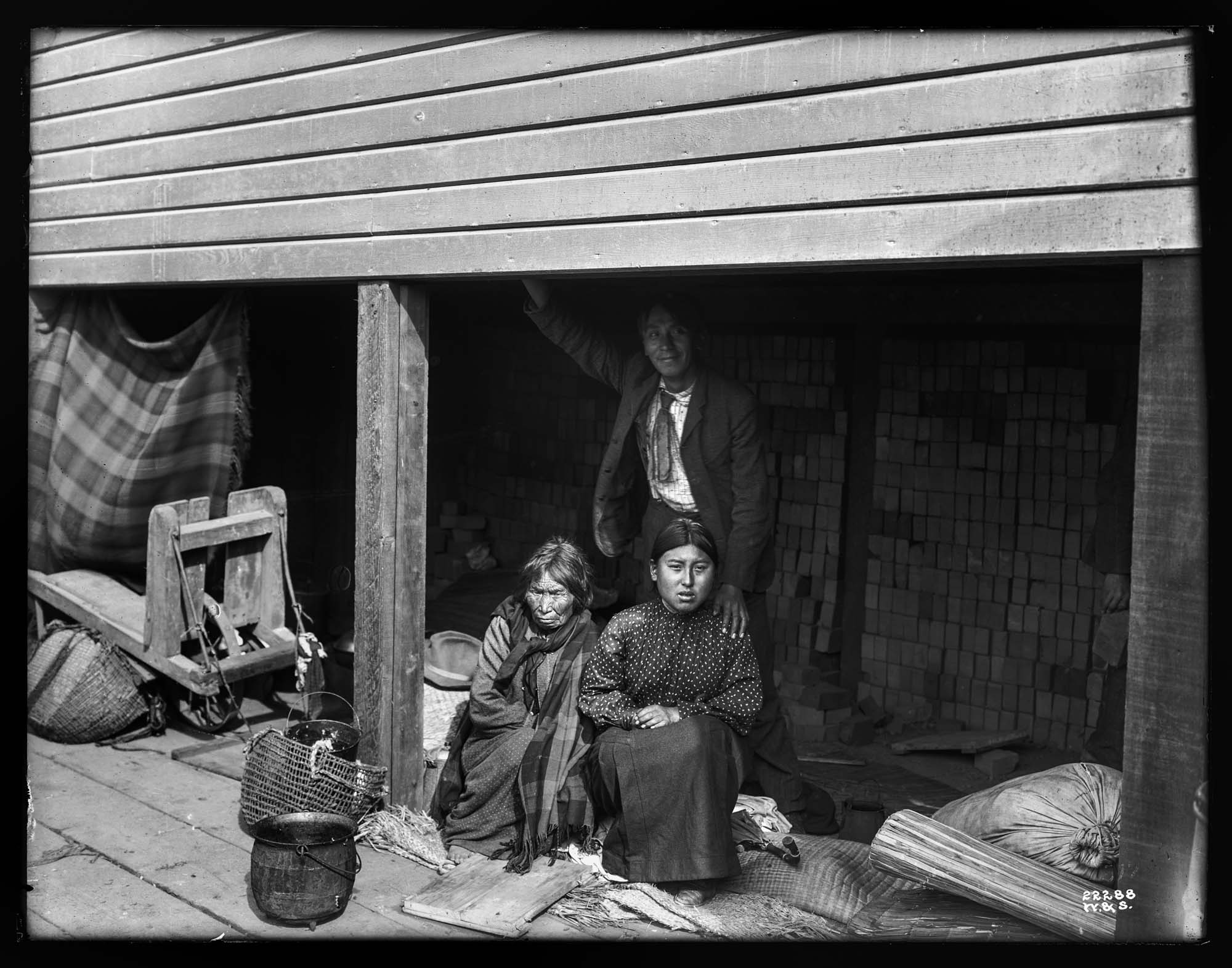 Image of Native American family camping near the waterfront, circa 1912