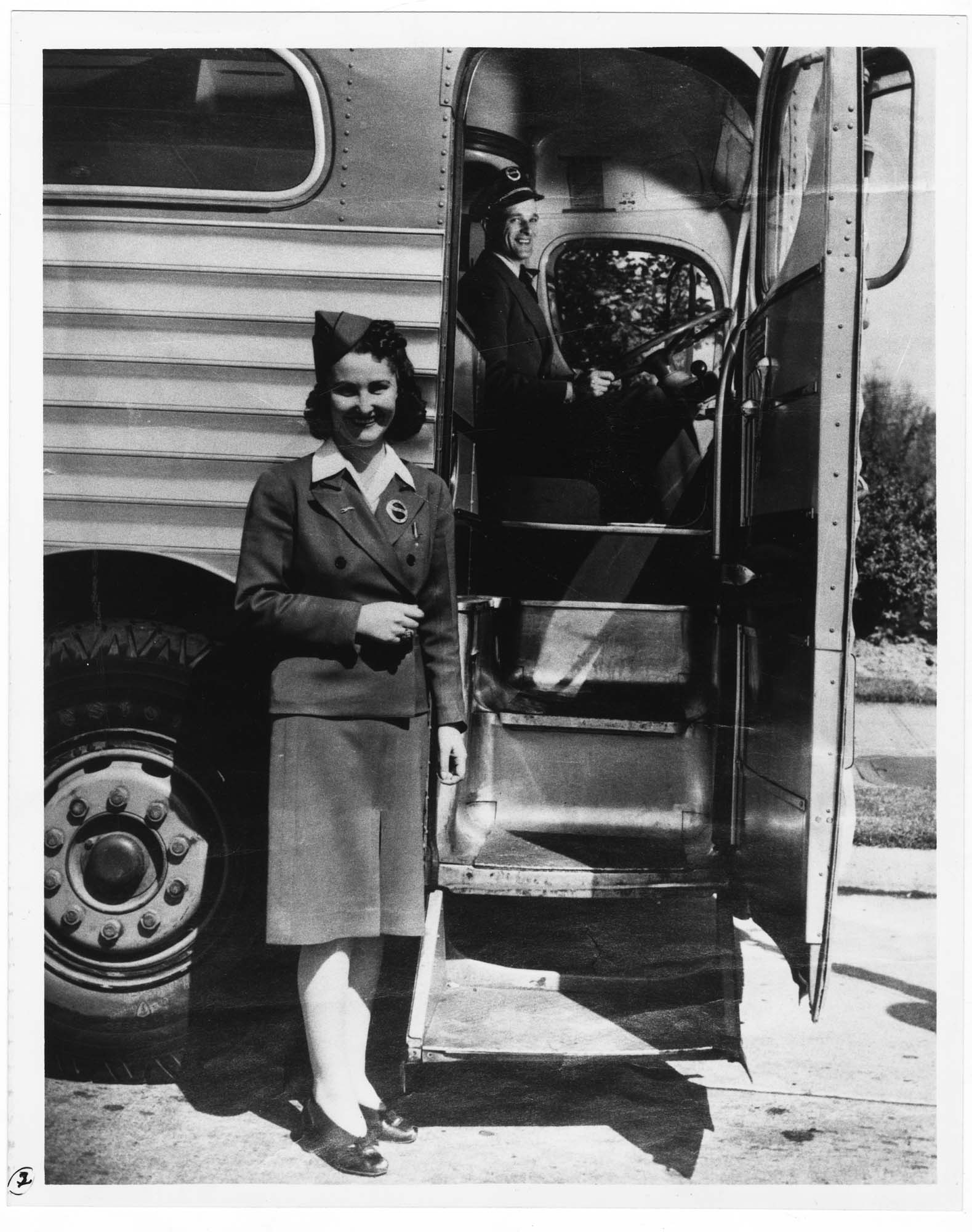 Image of Washington Motor Coach conductorette Bunny Burke and driver Whit Randall, 1940