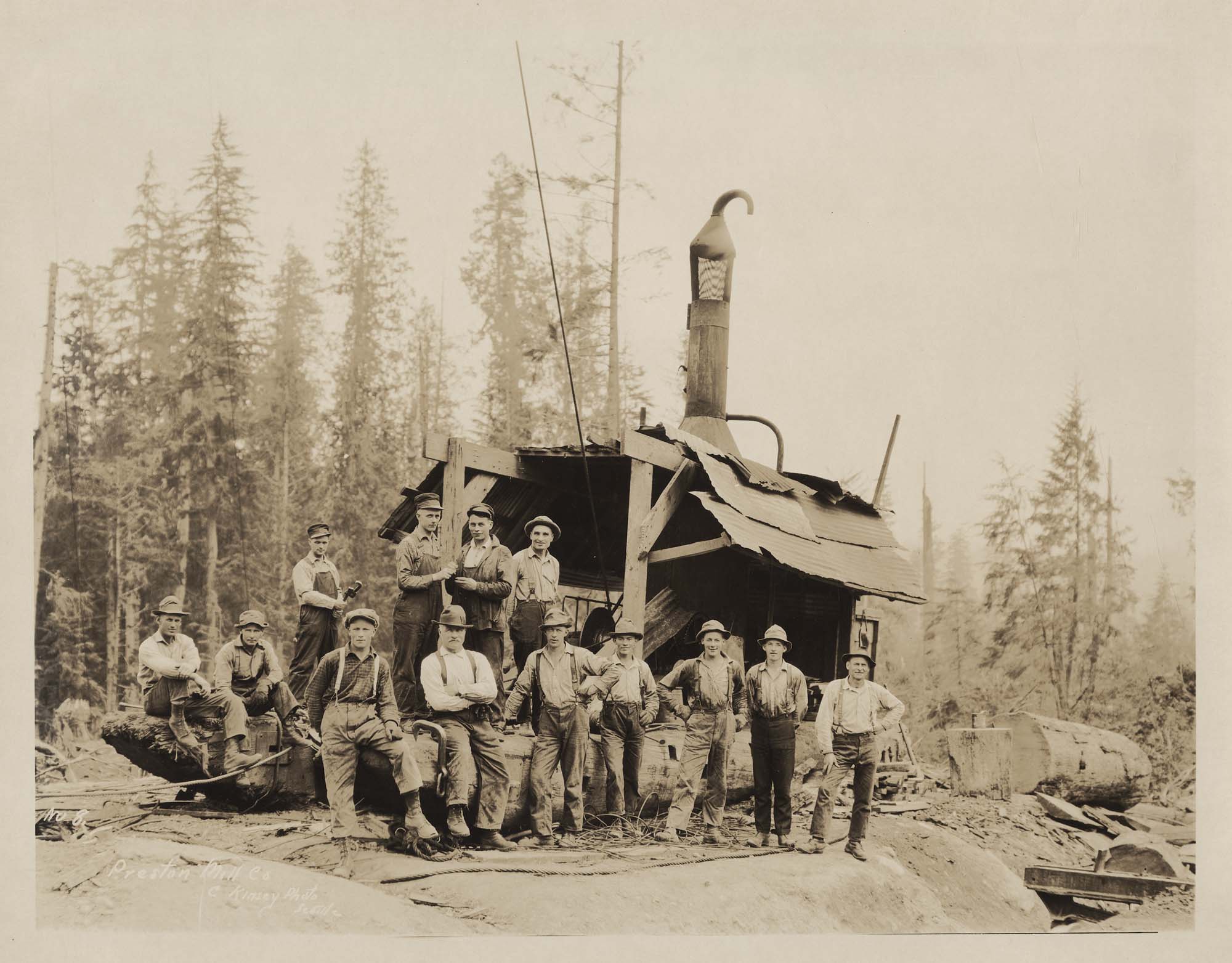 Image of Preston Mill Company employees and donkey engine, circa 1925