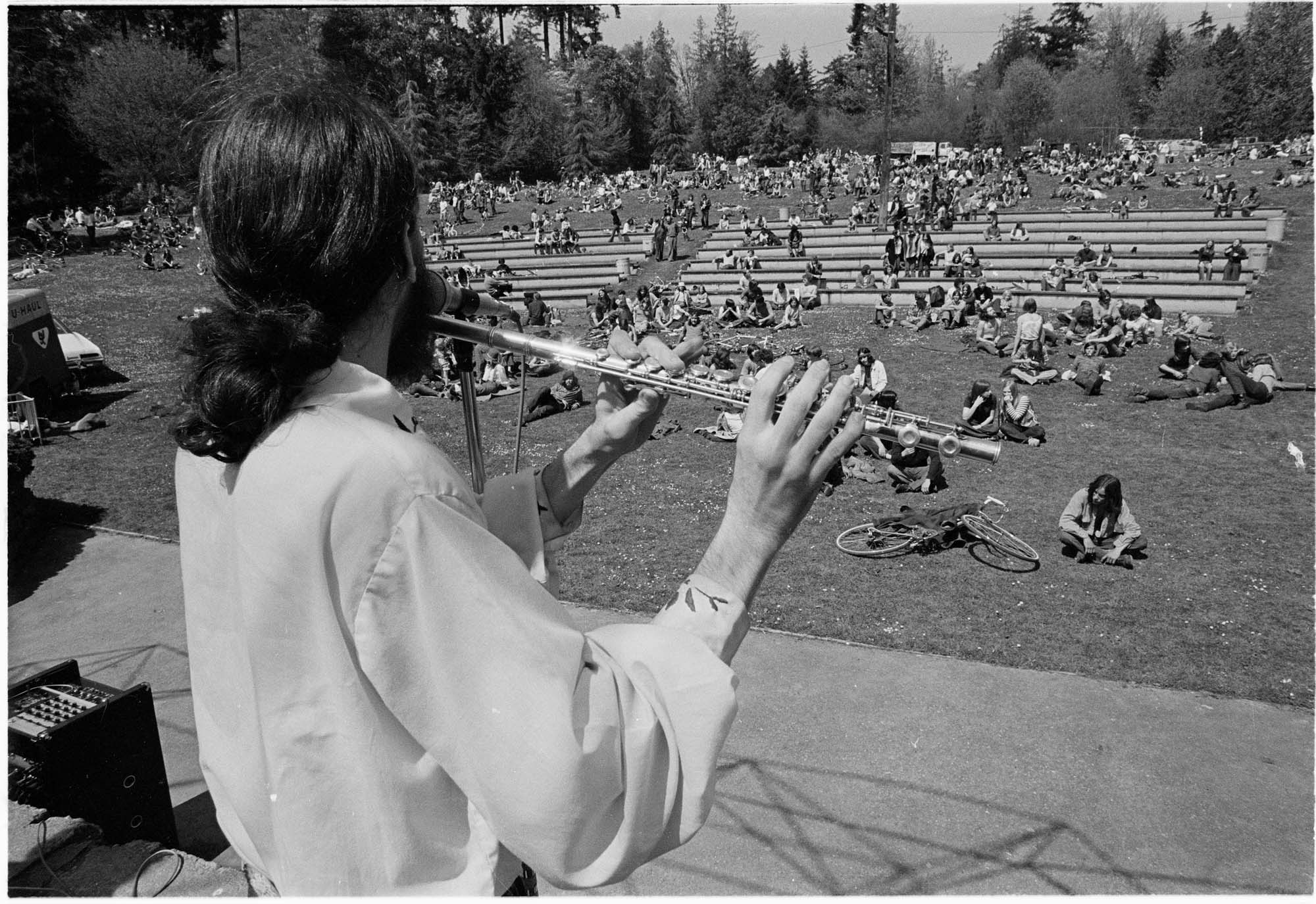 Image of Flute player at Earth Day gathering in Seward Park, Seattle, April 1971