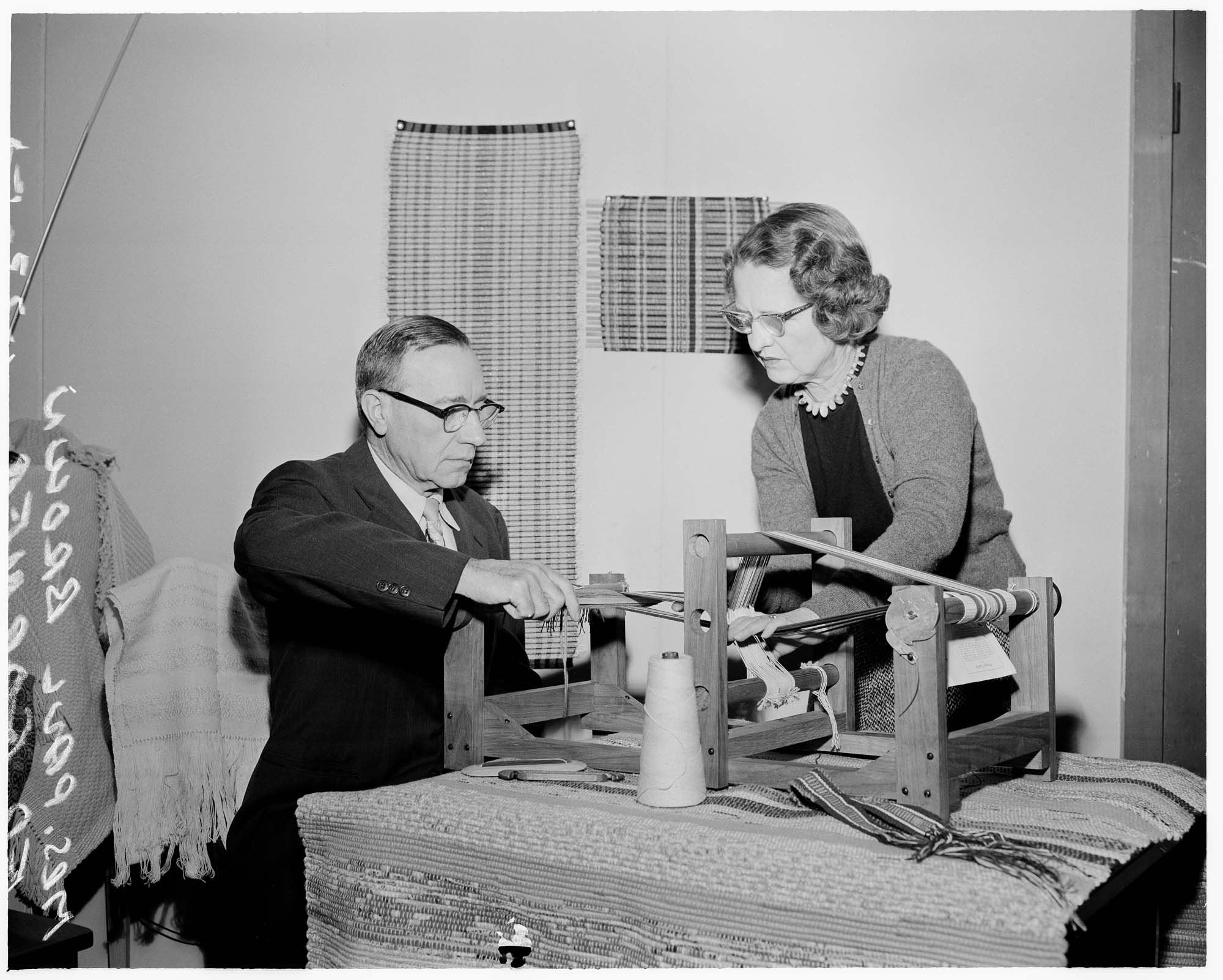 Image of Florence Brown helping Ed Garner weave at the Handicapped Center, Seattle, January 23, 1958