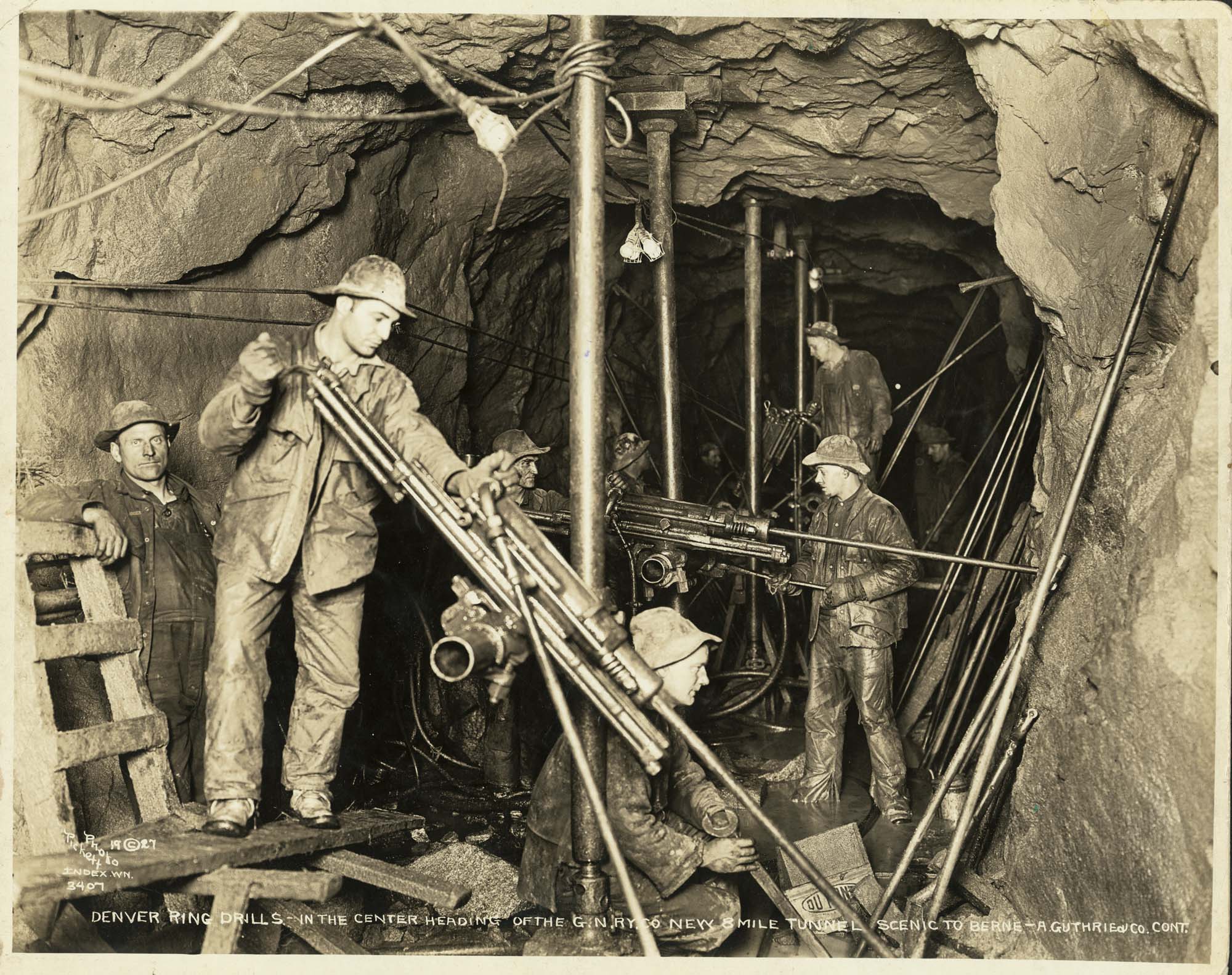 Image of Men drilling in the new Cascade Tunnel, 1927