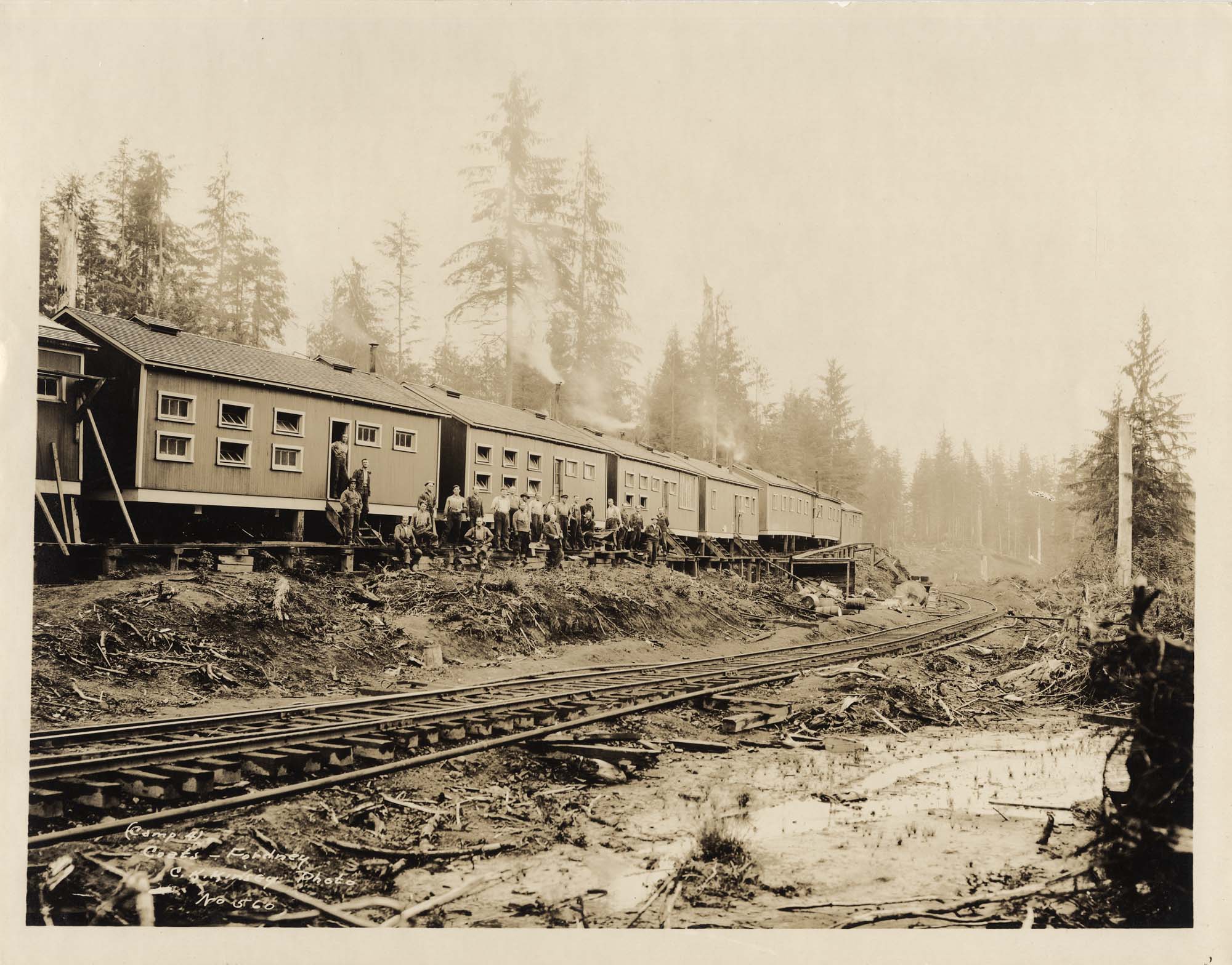 Image of Bunkhouses at Polson Logging Company camp, circa 1918
