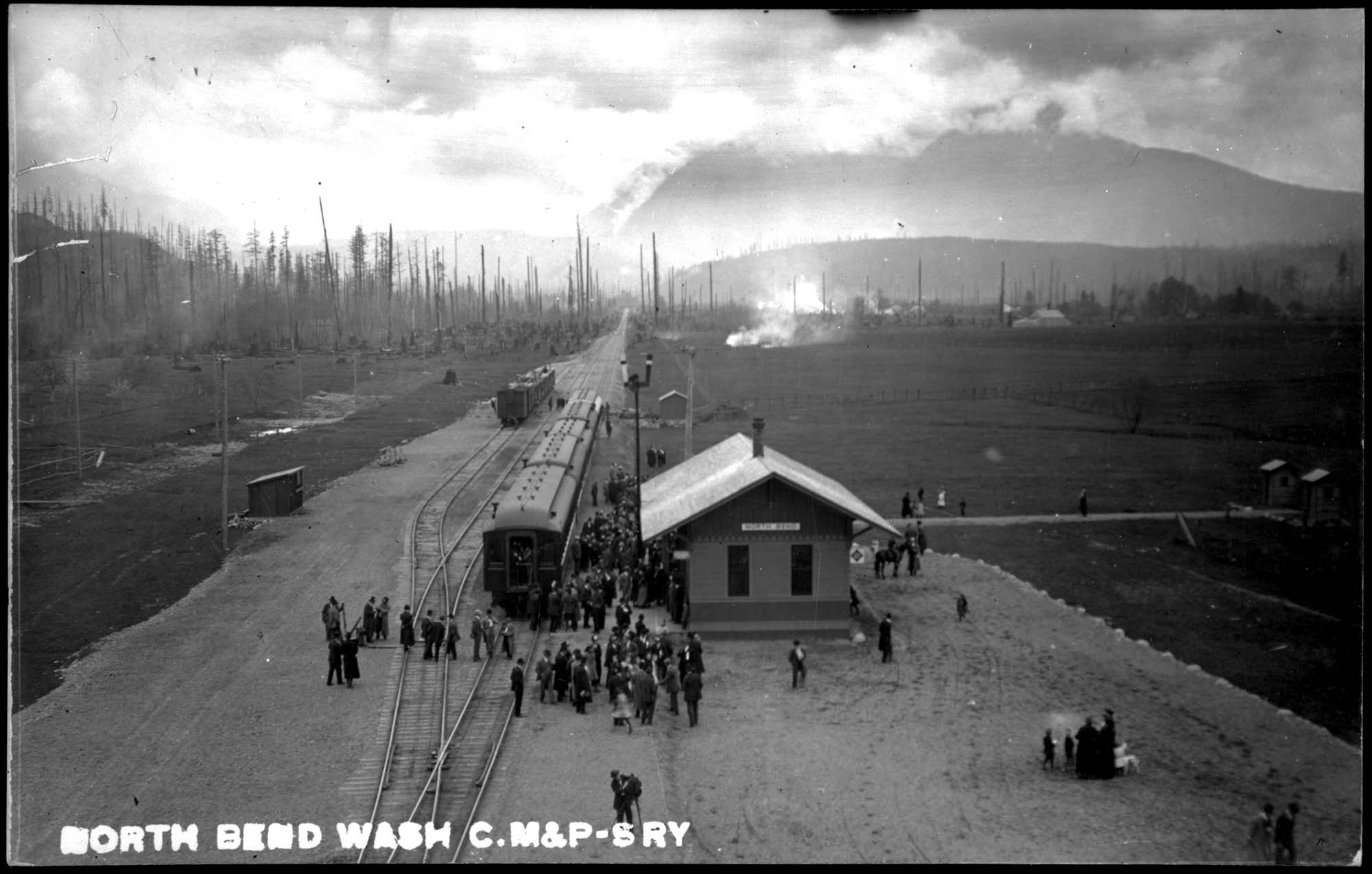 Image of Passenger cars at North Bend depot, circa 1910