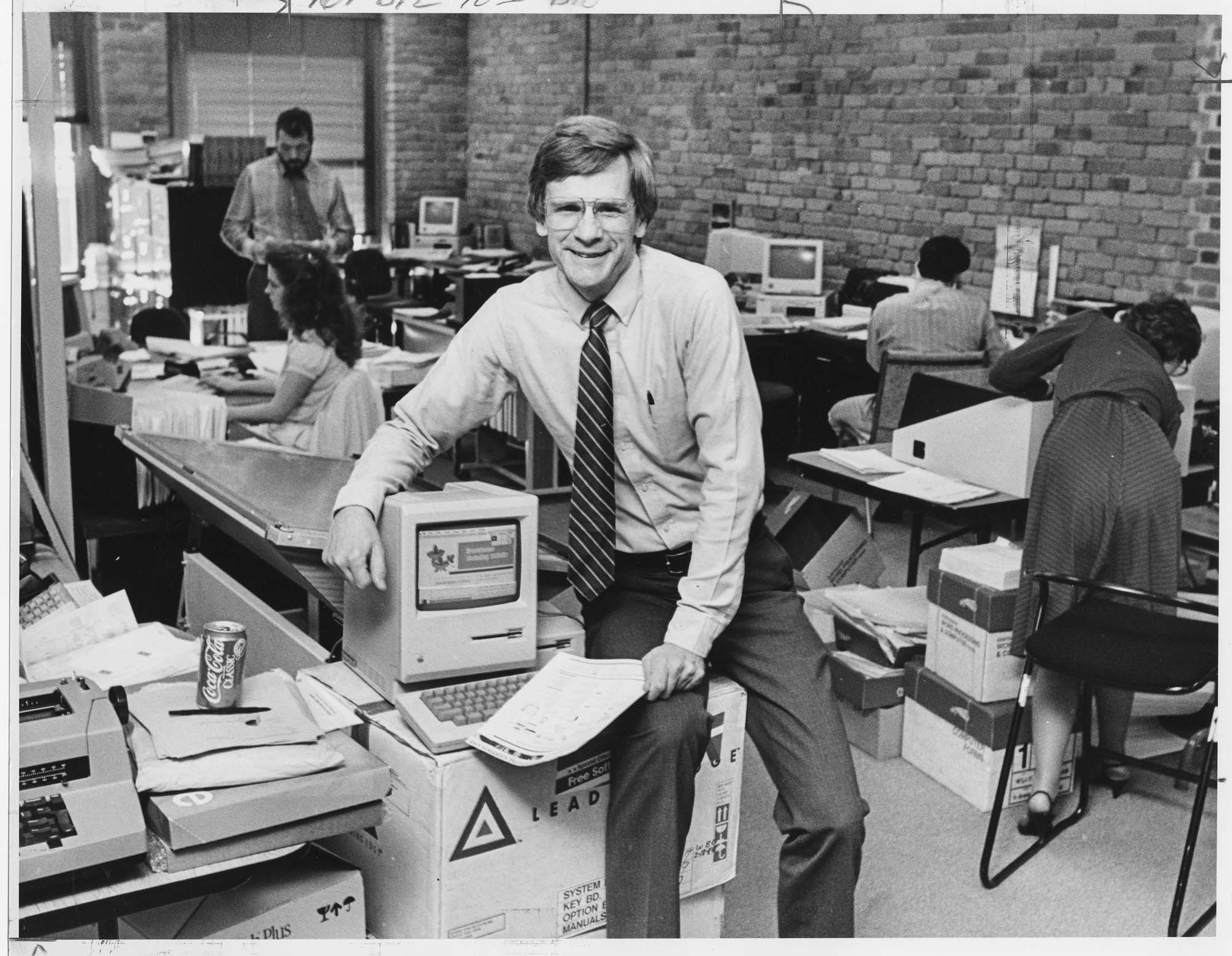 Image of Paul Brainerd in his office at Aldus Corp., March 1986