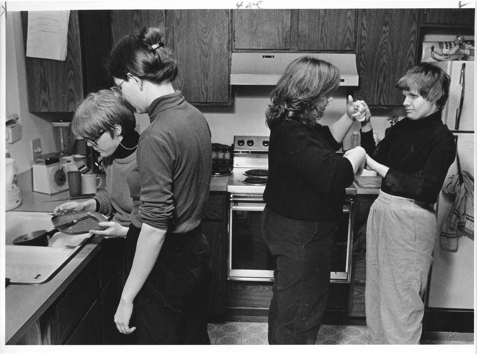 Image of Staff and residents at Daybreak adult family home for people with disabiities, Seattle, December 1984