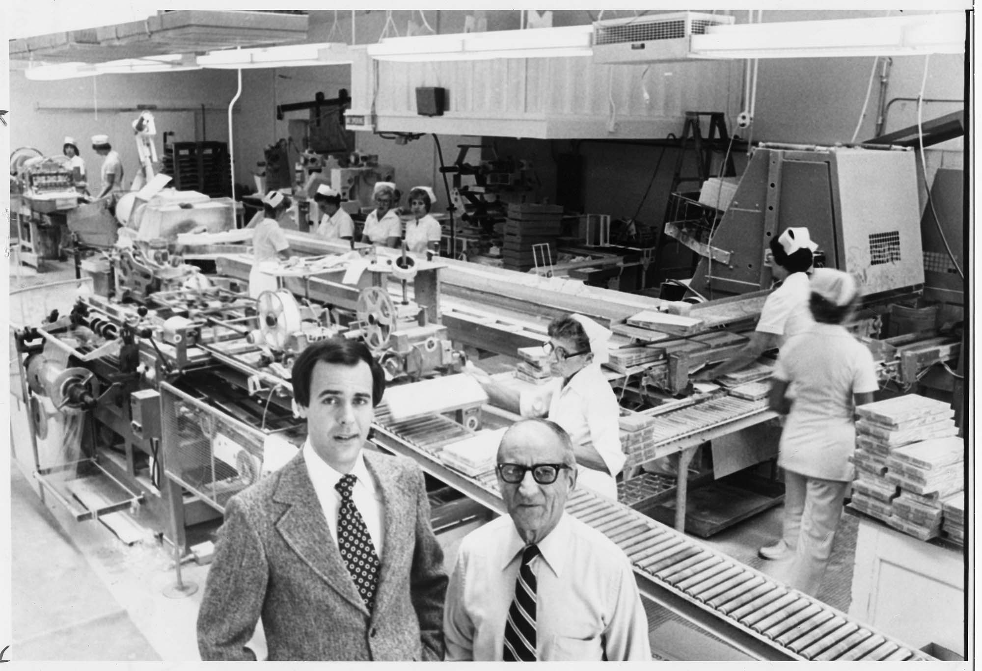 Image of John Chakirian and Gregory Taylor at Liberty Orchards candy factory, Cashmere, WA, August 1978