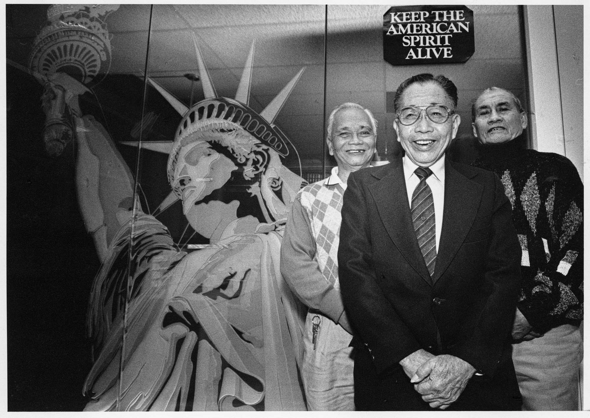 Image of Filipino veterans Benjamin Escano, Jose Morales, and Fidel Rubias at their lawyer's office, October 30, 1990