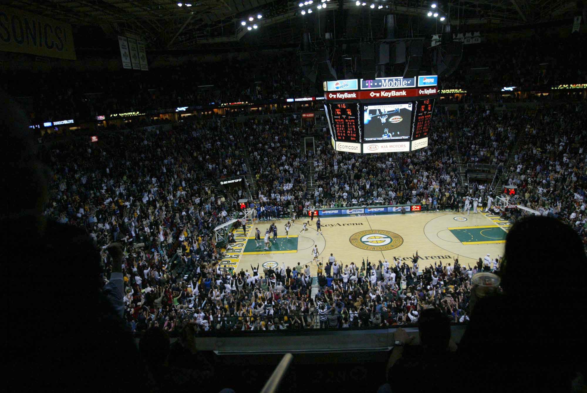 Image of Fans cheer on the Sonics with seconds left in their last home game, April 13, 2008