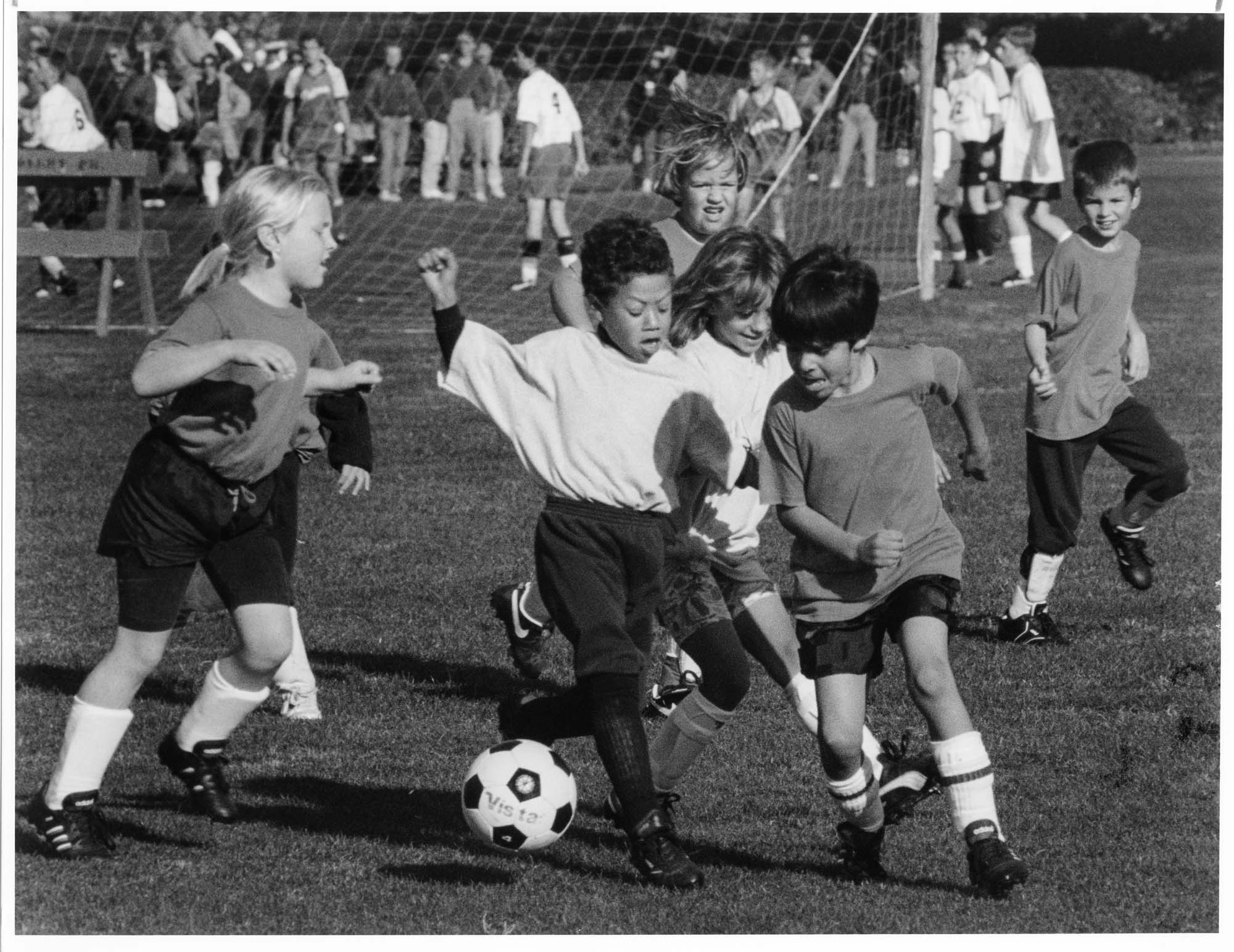 Image of Children playing soccer for the Magnolia Soccer Club, Seattle, October 14, 1993