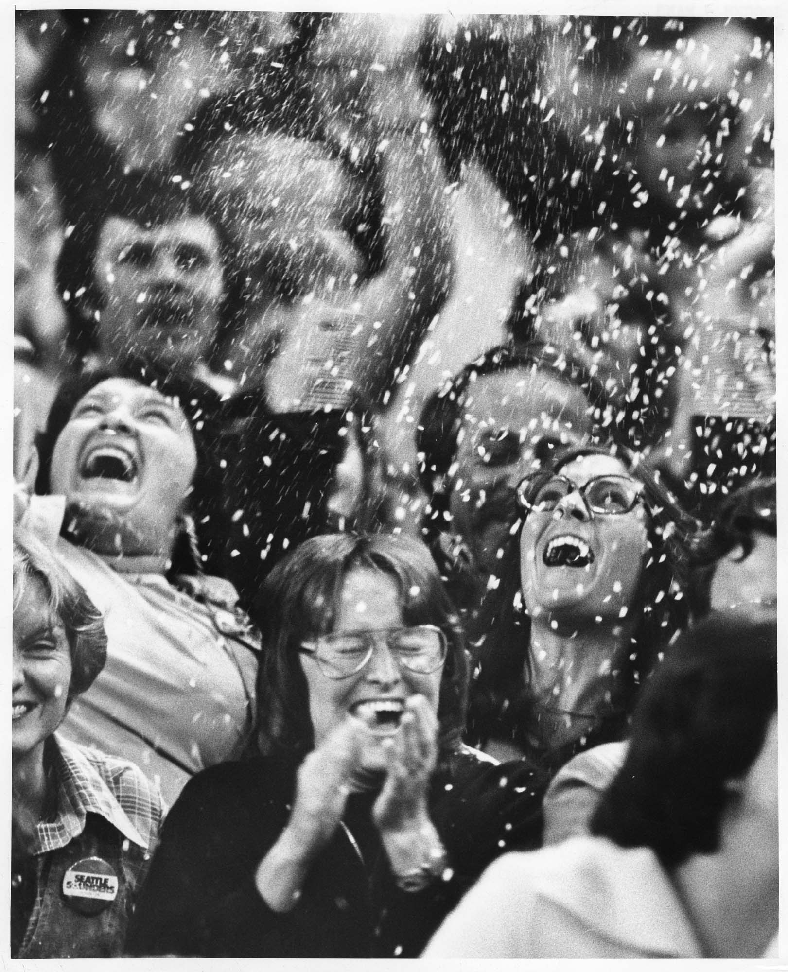 Image of Sounders fans amid confetti at Pacific Conference playoffs at the Kingdome, August 25, 1977