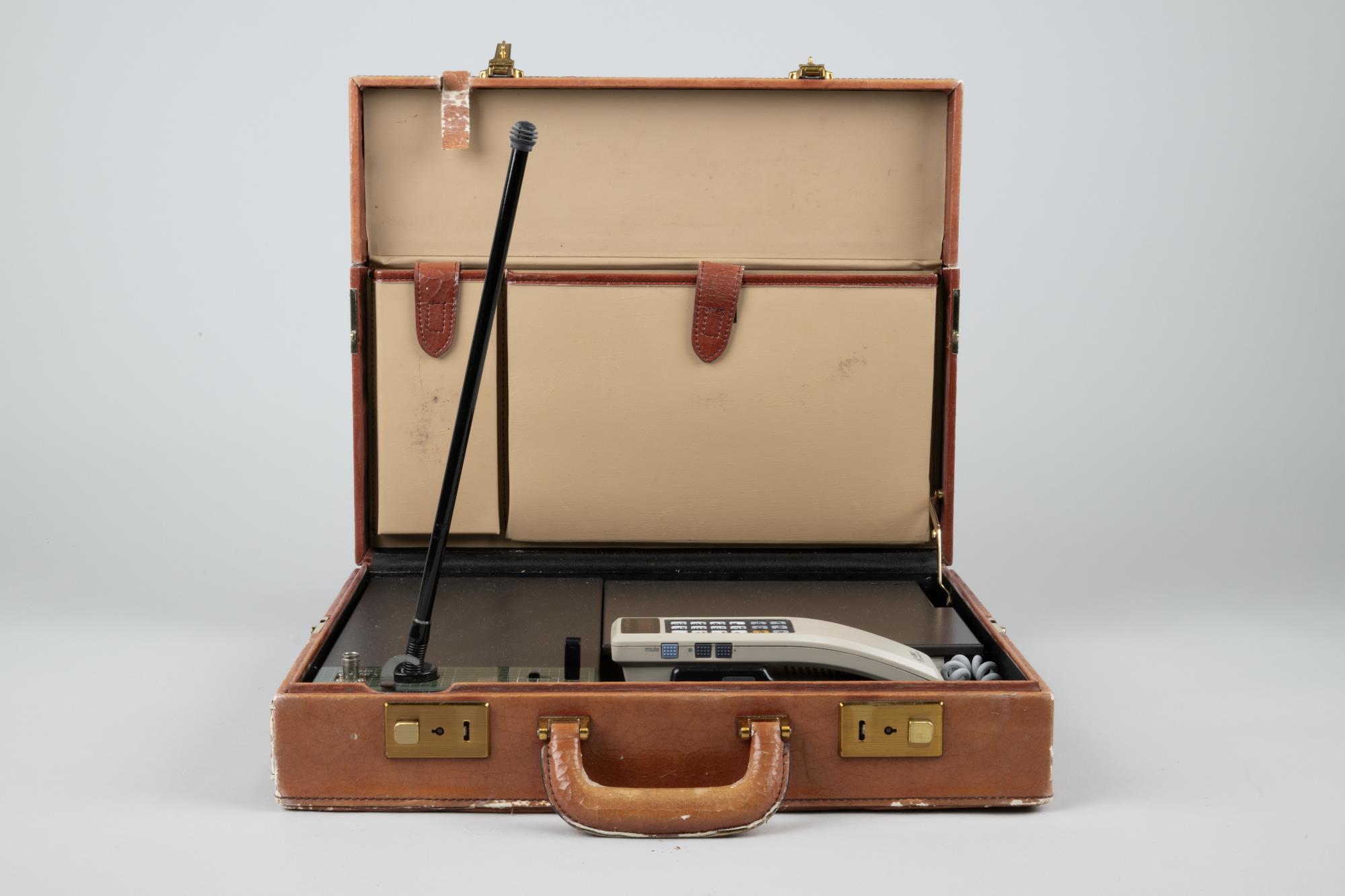 Image of OKI Electric car phone in briefcase, ca. 1985