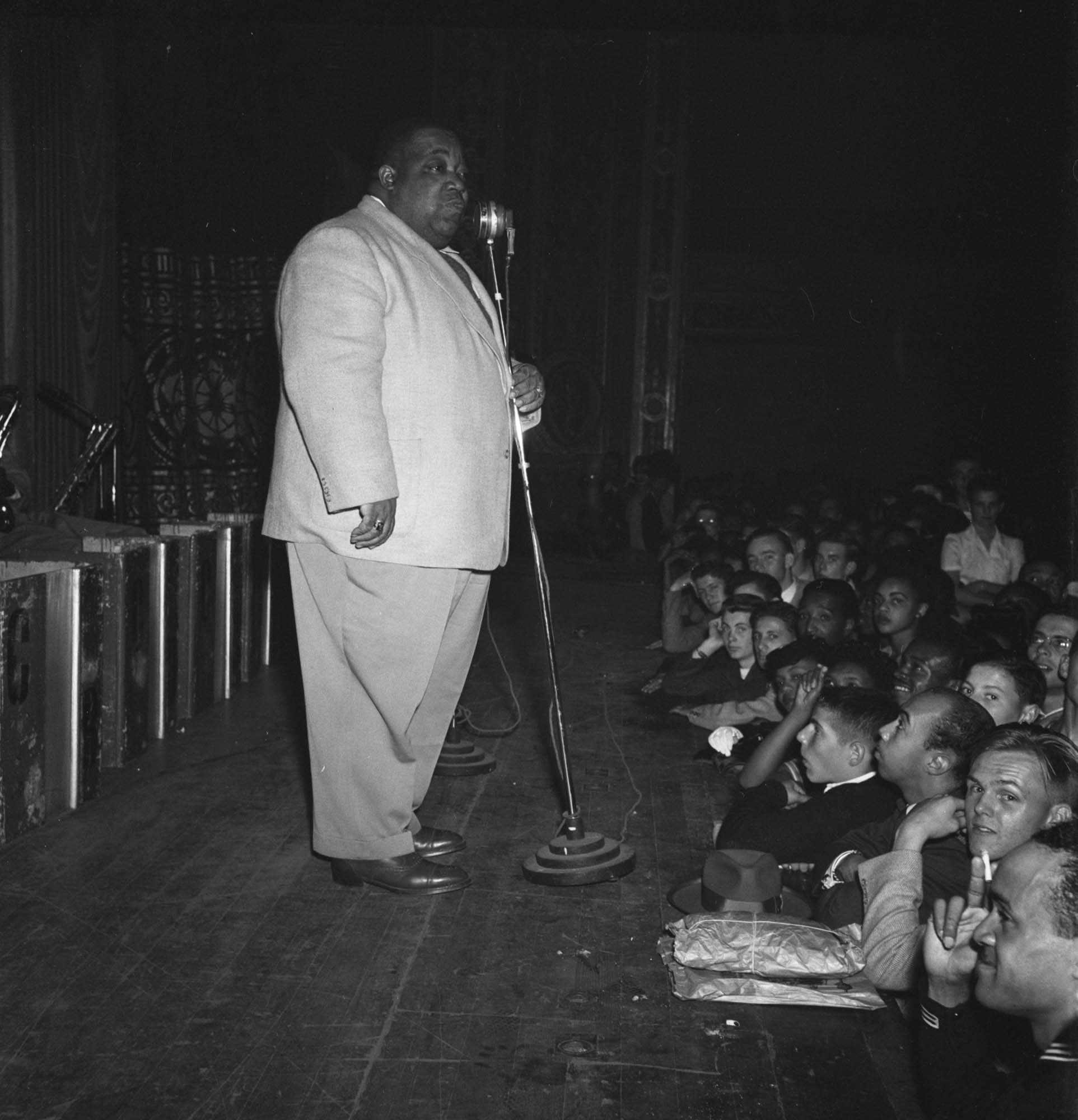 Image of Jimmy Rushing singing on stage at the Civic Auditorium, Seattle,  circa 1947