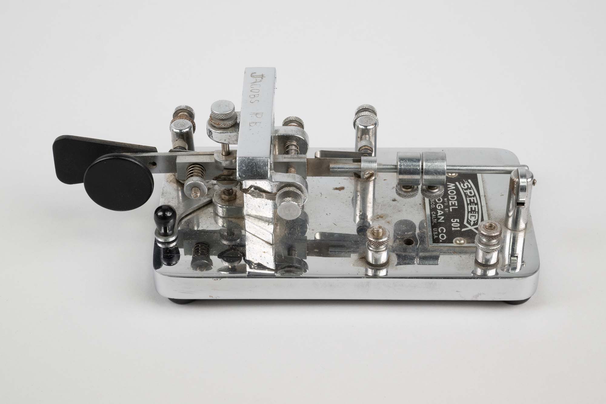 Image of Speed-X Morse Code Key used by Paul Jacobs while enlisted with the US Army Signal Corps on Adak Island, ca. 1942