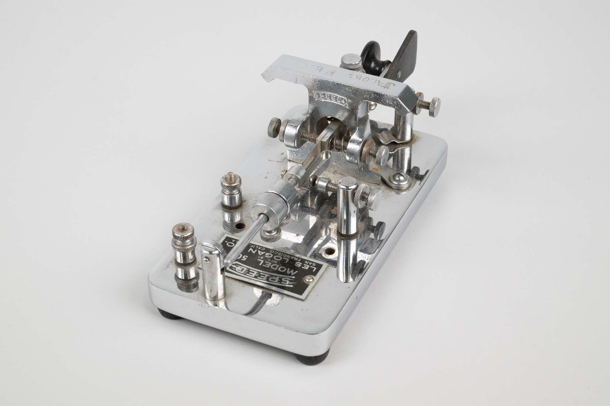Image of Speed-X Morse Code Key used by Paul Jacobs while enlisted with the US Army Signal Corps on Adak Island, ca. 1942