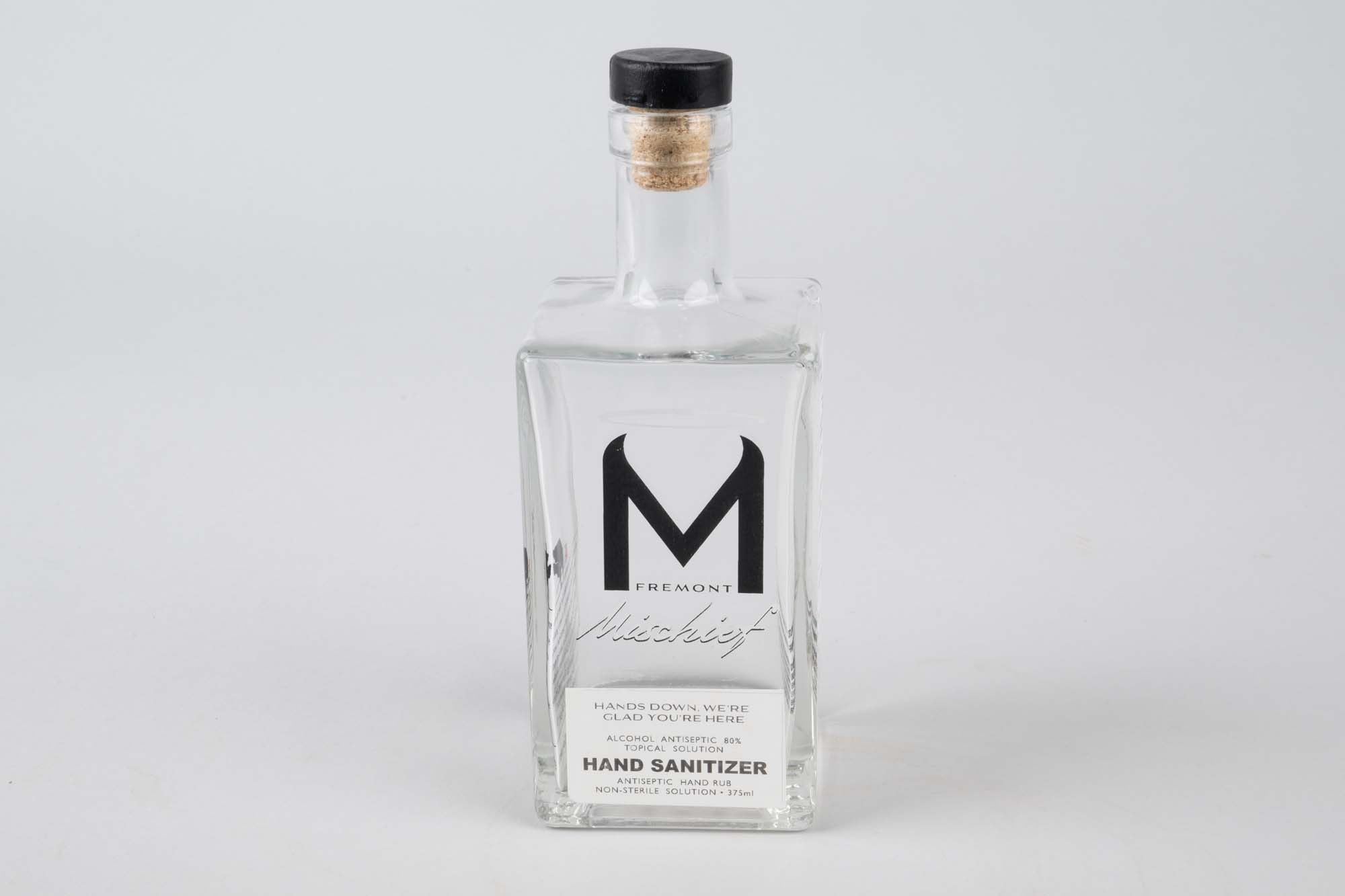 Image of Glass bottle of hand sanitizer from Fremont Mischief Distillery, 2020
