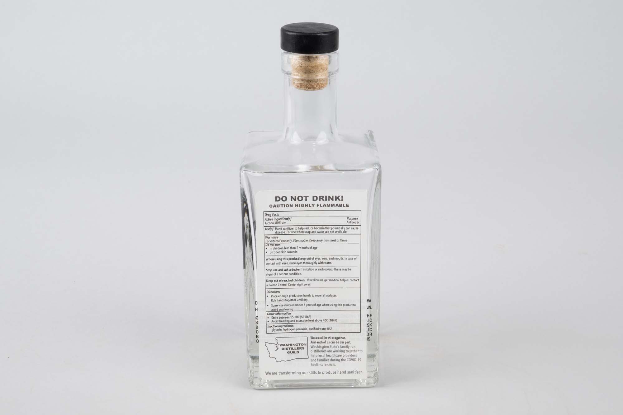 Image of Glass bottle of hand sanitizer from Fremont Mischief Distillery, 2020