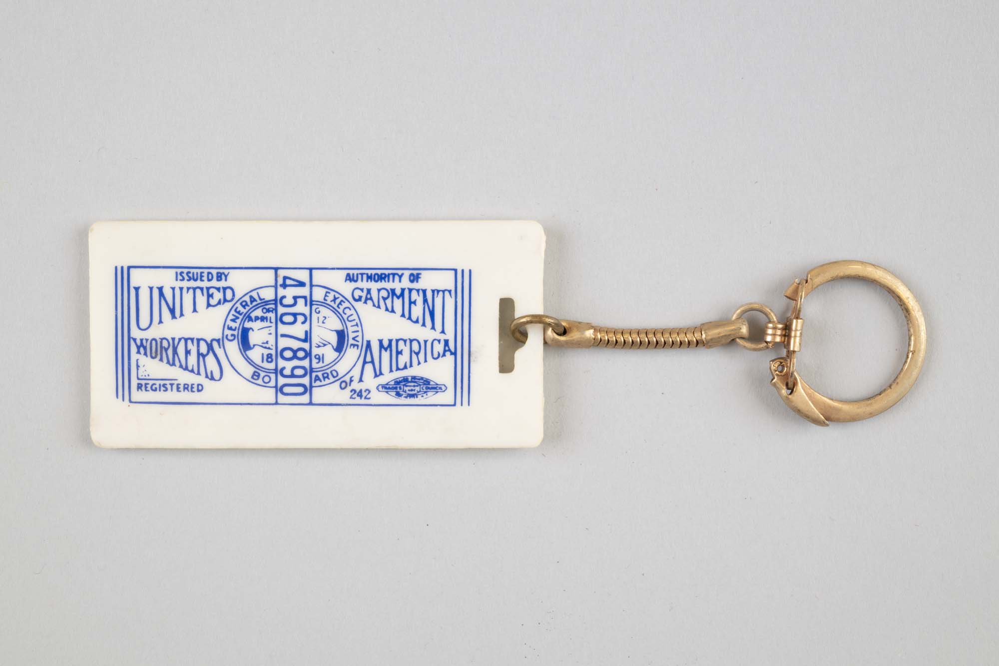 Image of United Garment Workers keychain belonging to Betty Kugland, ca. 1970s-1980s