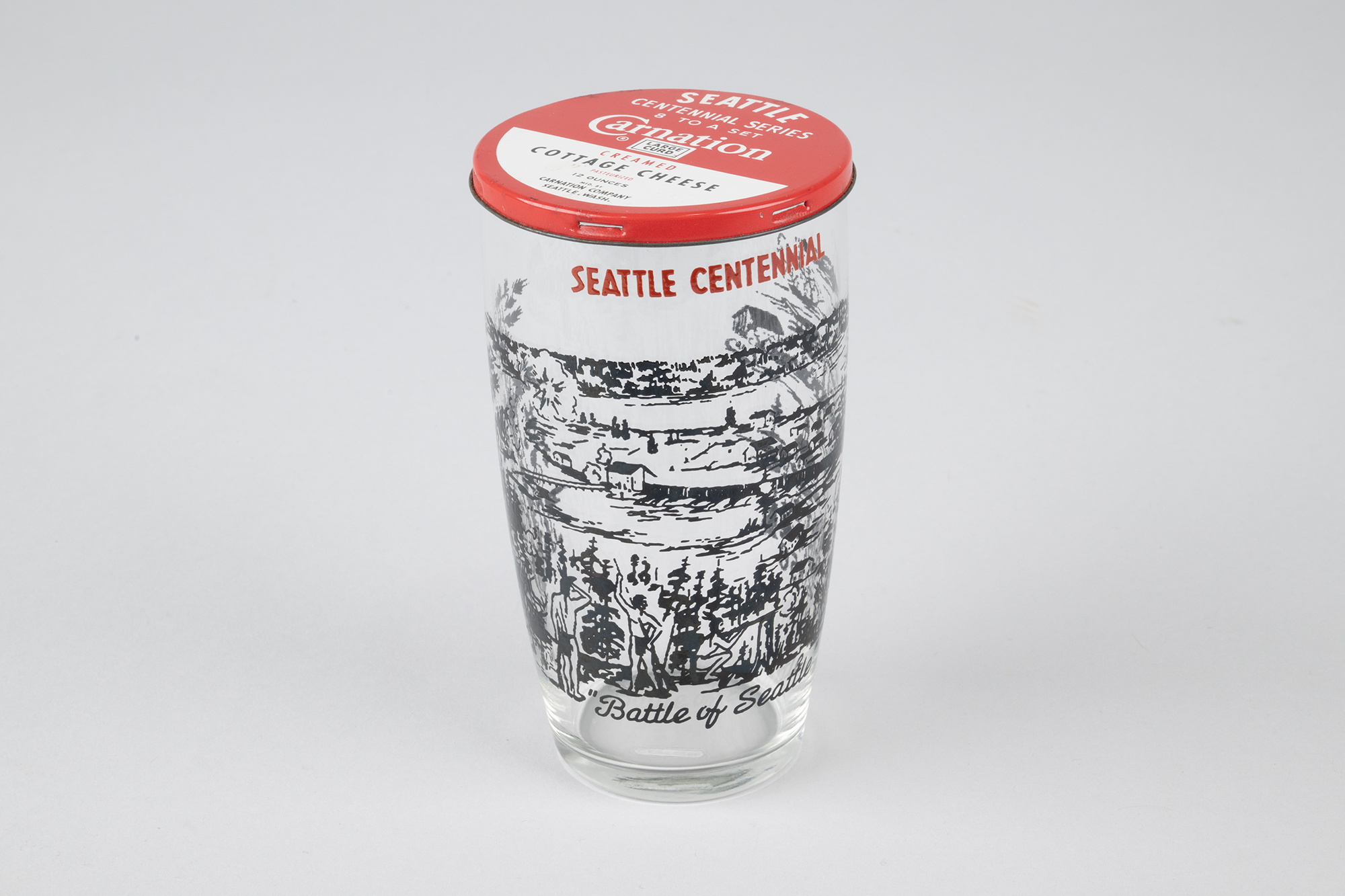 Image of Set of eight Seattle Centennial glasses with Carnation Cottage Cheese tin lids, 1952