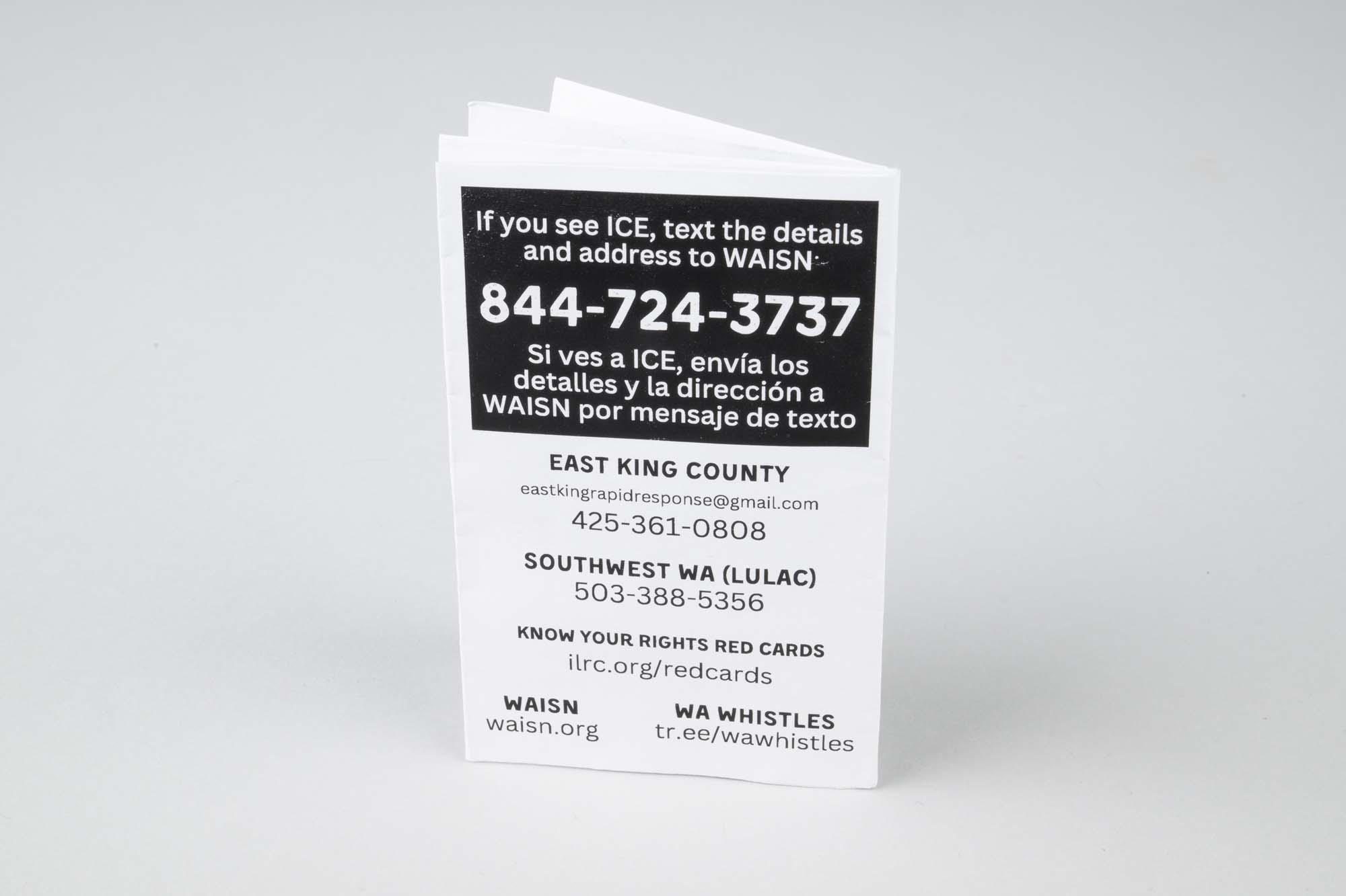 Image of Red whistle and instruction booklet for alerting neighbors to ICE activity, 2026