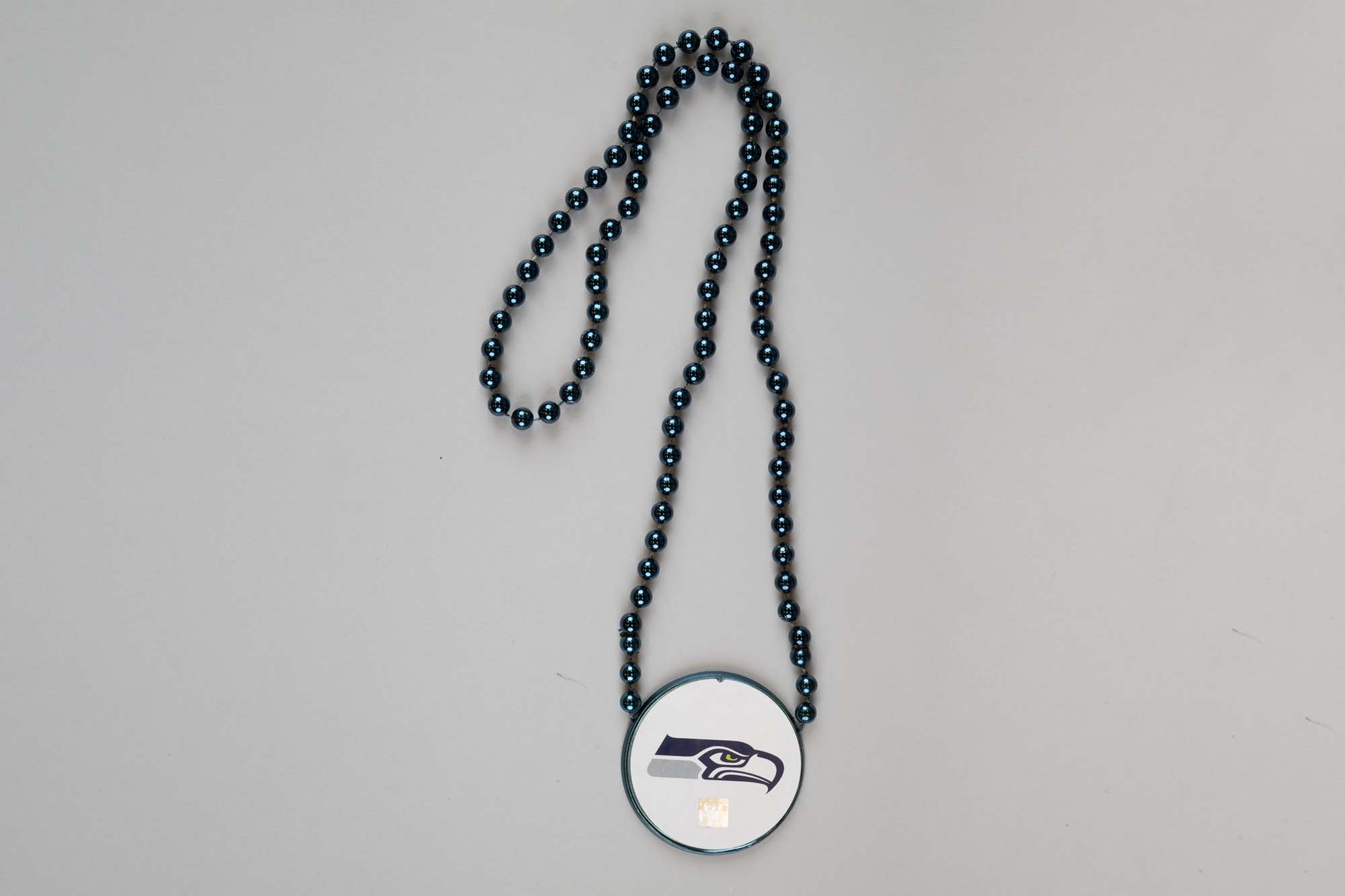 Image of Super Bowl LX beaded necklace souvenir for member of the Seattle Seahawks Ring of Honor club, 2026