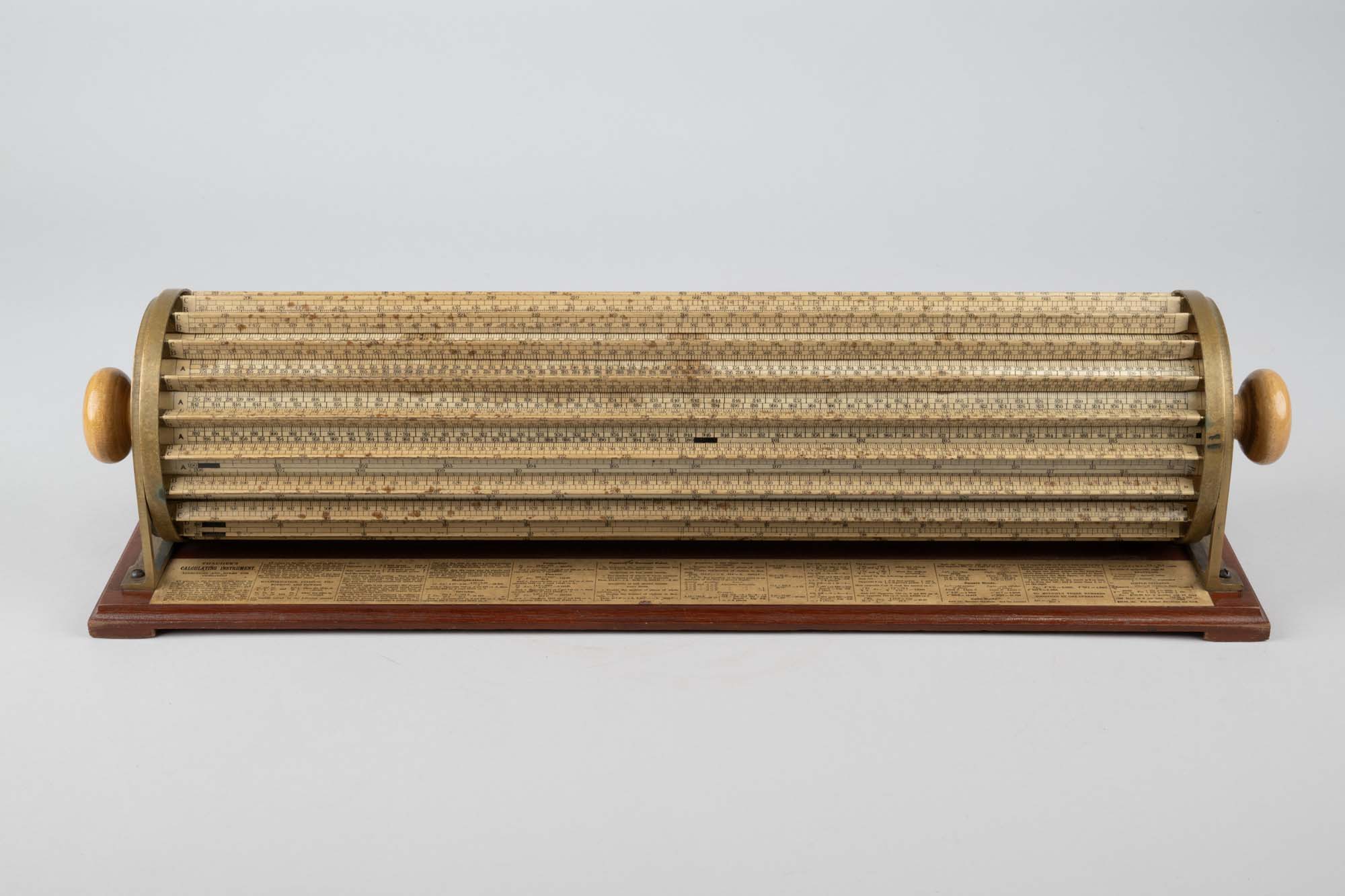 Image of Thacher's calculating instrument (cylindrical slide rule) by Keuffel & Esser, 1881