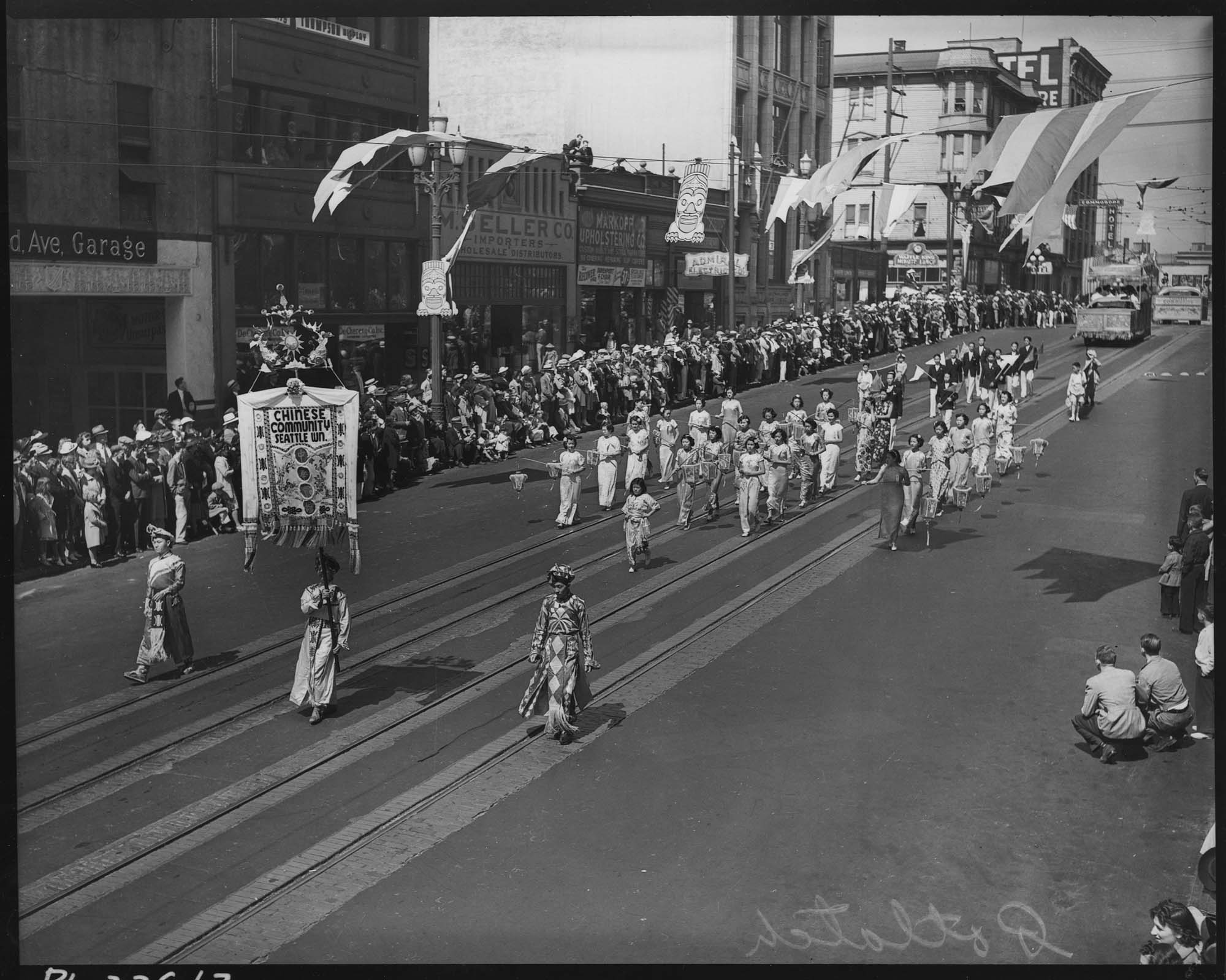 Image of Chinese community marchers in Potlatch parade on Second Avenue, Seattle, 1938