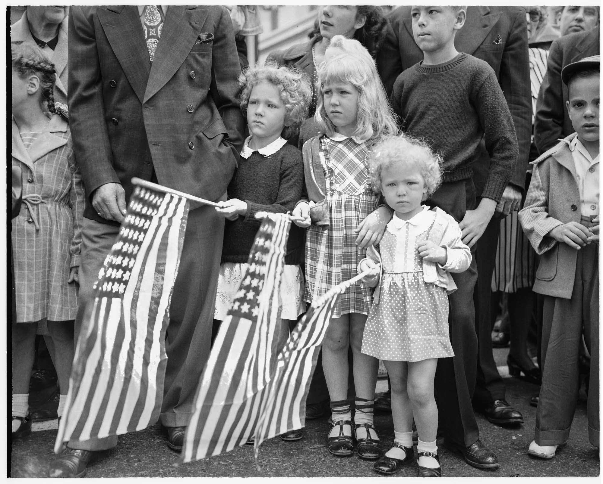 Image of Children watching Independence Day parade, July 4, 1947