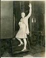 Image of Helene Madison waving from train steps, circa 1929