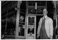 Image of Bert Weed in front of Weed's pharmacy, Seattle, July 3, 1952