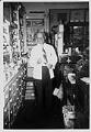 Image of Bert Weed inside Weed's pharmacy, Seattle, July 3, 1952