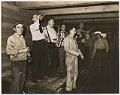 Image of Yard workers and band celebrating launch at Olson & Winge Marine Works yard, Seattle, June 1944