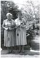 Image of Sue Jean Price and friend with their cameras, Seattle, circa 1964