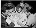 Image of Four men playing mahjong, Seattle, April 1947