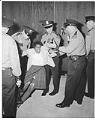 Image of Police removing demonstrator from City Hall, July 25, 1963