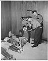 Image of Police removing demonstrator from City Hall, July 25, 1963