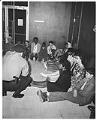 Image of Assistant Police Chief Charles Rouse with demonstrators at City Hall, July 25, 1963