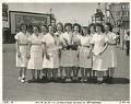 Image of Puget Sound Bridge and Dredging Company employees acting as waitresses for the APL 49 launch party, Seattle, May 29, 1945
