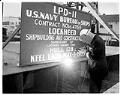 Image of Welder at launch of the USS Coronado at the Lockheed Shipbuilding and Construction Company shipyard, Seattle, July 1, 1966