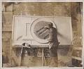 Image of Frank Lemon working on clay model at Pacific Stone Company, Seattle, circa 1926