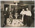Image of Ben Paris and two men posing at Ben Paris Sporting Goods and Recreation, Seattle, circa 1935