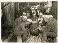 Image of Cadets peeling potatoes at the Naval Training Station, Seattle, circa 1918