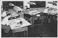 Image of Four members of Bemis Bag Co. art department working at drafting tables, circa 1955