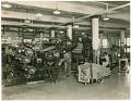 Image of Bemis Bag Co. employees working at burlap web press, November 30, 1926