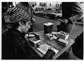 Image of AIDS Prevention Project volunteer at needle exchange, Seattle, February 20, 1990