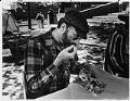 Image of Man working on quilt square during AIDS vigil at Seattle Central Community College, Seattle, May 29, 1988