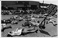 Image of Demonstrators lying on ground at ACT-UP demonstration, Seattle, June 26, 1990
