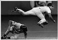 Image of Seattle Mariners shortstop Jeff Schaefer jumping over base runner, April 15, 1991