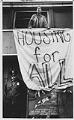 Image of Low-income housing advocate protesting at McKay Apartments, Seattle, July 1, 1989